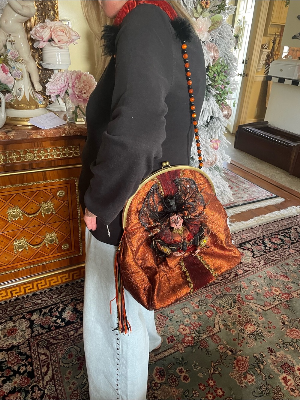 Vintage-Inspired Metallic Orange Shoulder Bag with Floral Accent